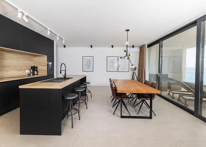 Aqua Blue By Belmont Realty *