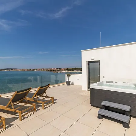 Aqua Blue By Belmont Realty *