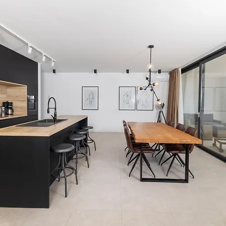 Aqua Blue By Belmont Realty *