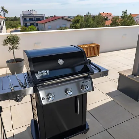 Aqua Blue By Belmont Realty