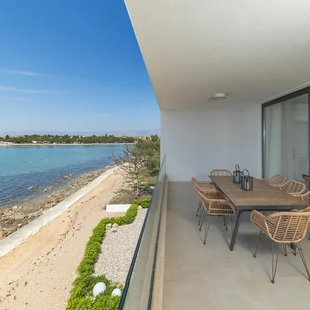 Aqua Blue By Belmont Realty *