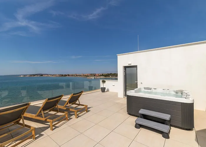 Aqua Blue By Belmont Realty *