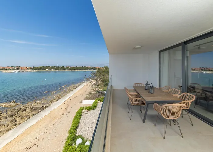 Aqua Blue By Belmont Realty *